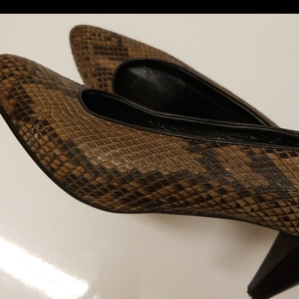 A snake skin  shoes high heels